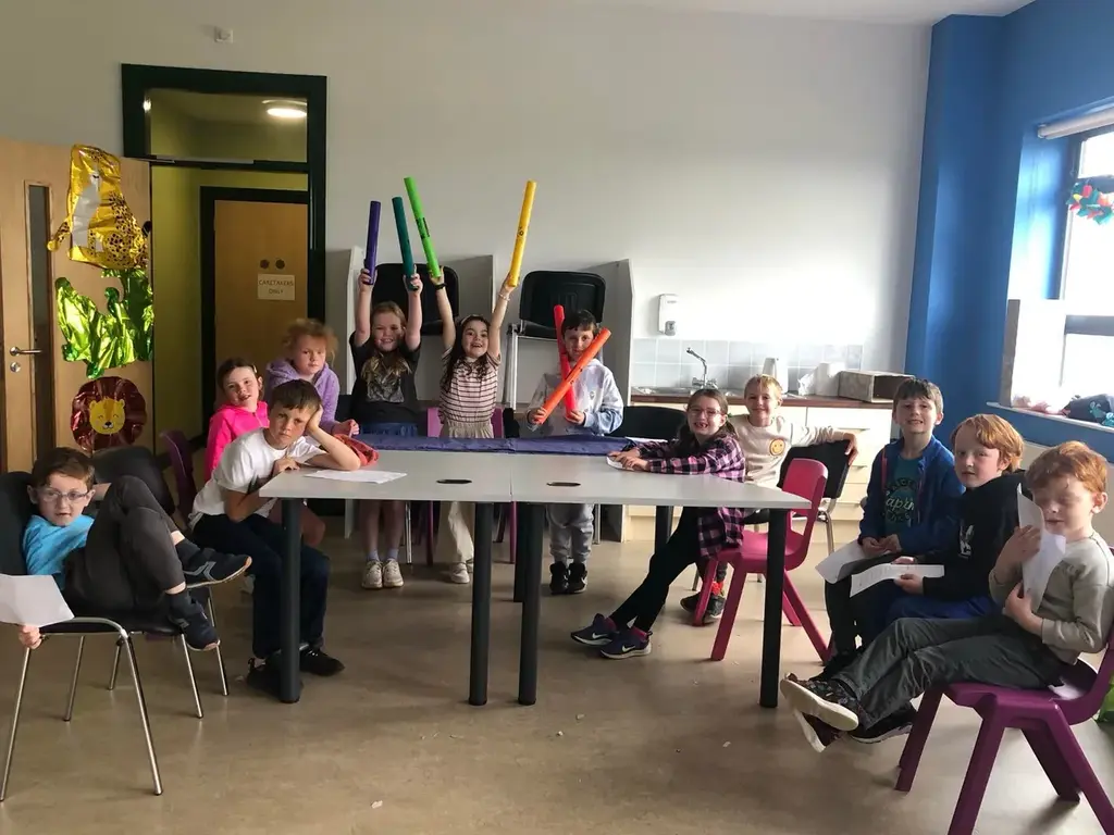 Children playing with foam batons