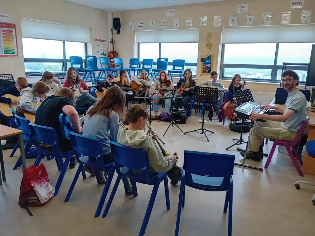 String ensemble lesson in a classroom